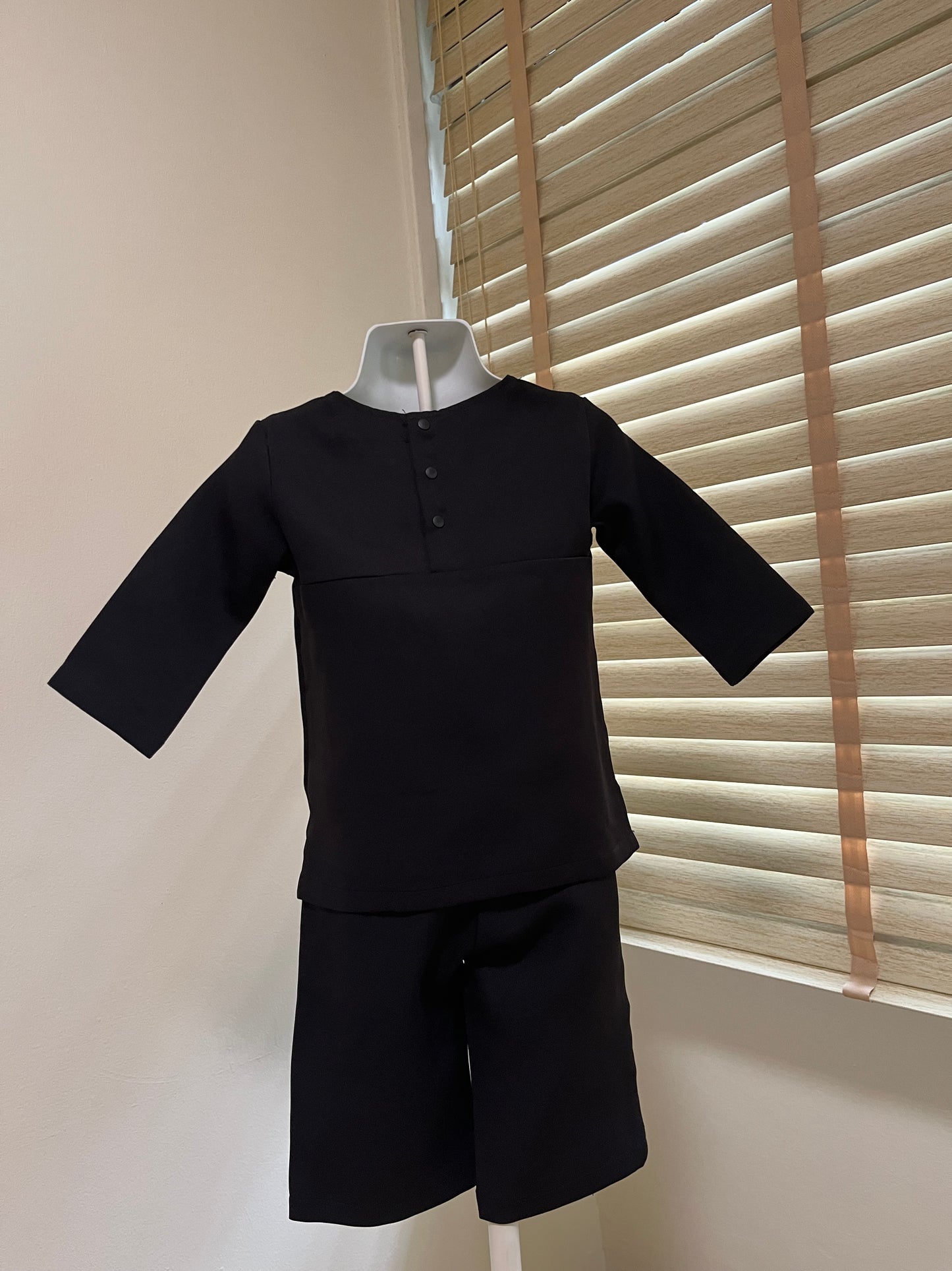 Daniel Baju Melayu