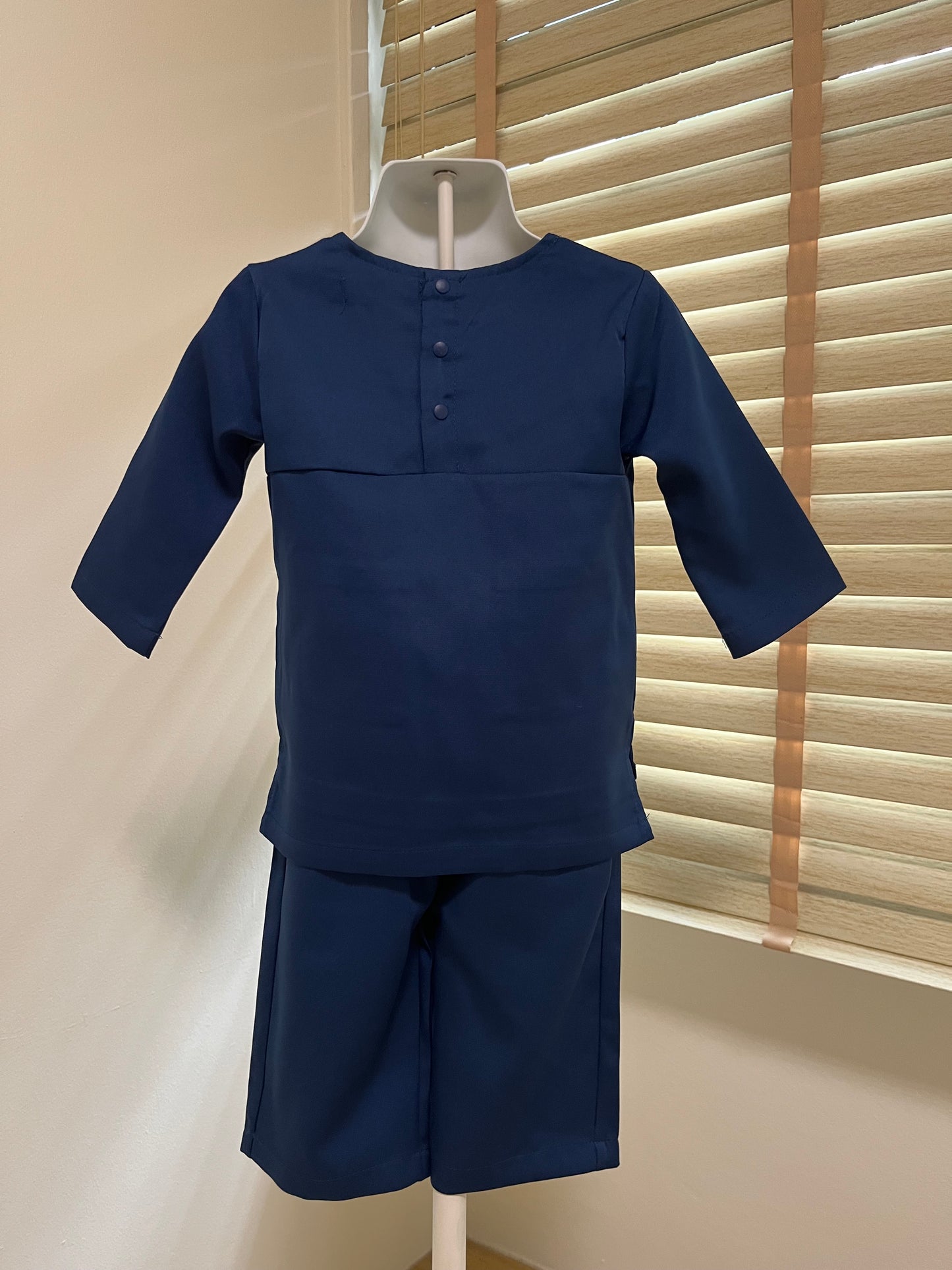 Daniel Baju Melayu