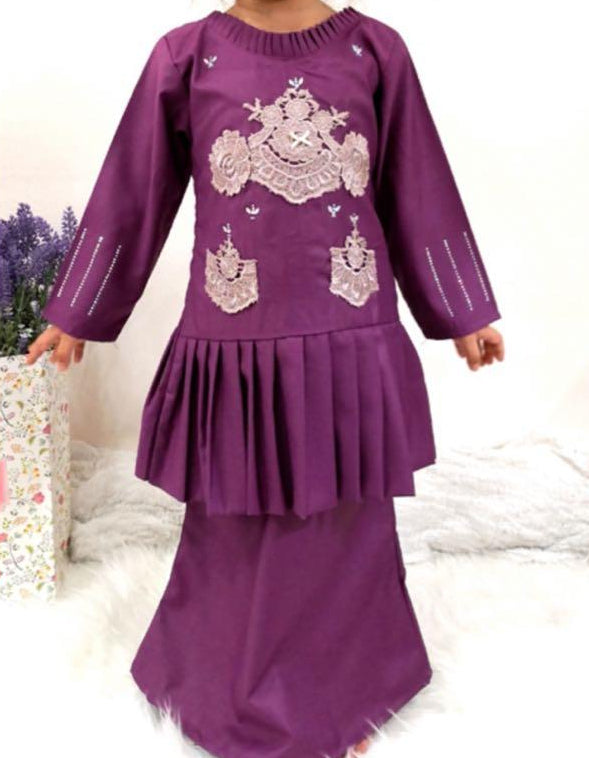 Ninelle Pleated Lace Kurung